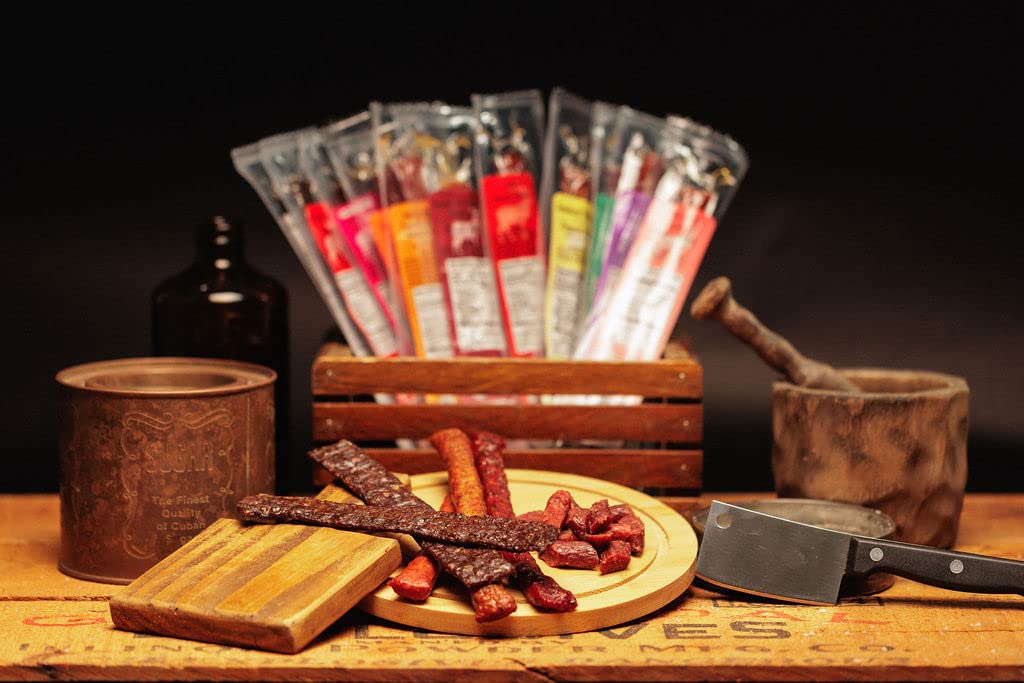 Jerky.com Exotic Meat Sticks Gift Bag | Wild Game Jerky Sampler with Venison, Elk & Wild Boar | 12pc High Protein Meat Snacks Variety Pack | Unique Gift Basket for Men, Dad, Hunters, Outdoorsmen